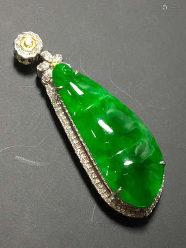 A GREEN JADEITE PENDANT OF LUCKY BEAN