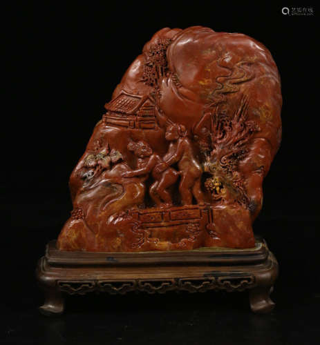 A SOAPSTONE ORNAMENT CARVED STORY-TELLING PATTERN