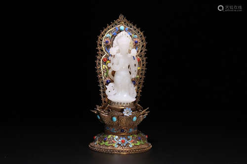 A HETIAN JADE GUANYIN BUDDHA ON SILVER GILT BASE