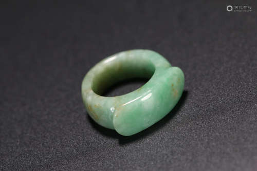 A SADDLE SHAPED JADE RING