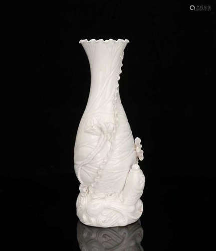 A WHITE GLAZED PORCELAIN VASE CARVED FISHES