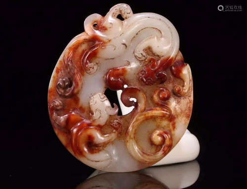 AN ANCIENT JADE CHILONG BEAST PENDANT