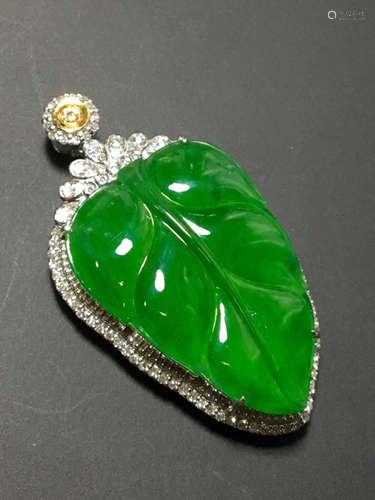 A GREEN JADEITE PENDANT OF LEAF