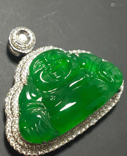 A GREEN JADEITE PENDANT OF BUDDHA