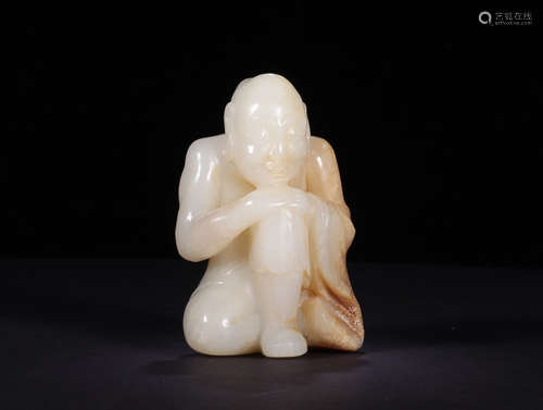 A HETIAN JADE ROHAN STATUE