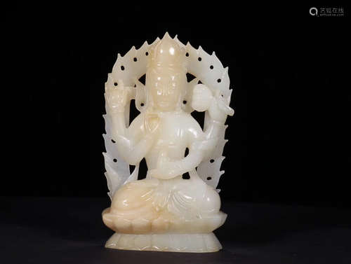 A FOUR-ARM DESIGN HETIAN JADE GUANYIN STATUE