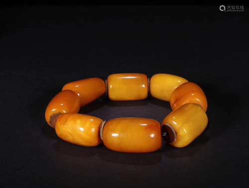 A STRING OF MIDDLE EAST OLD-BEESWAX BEADS BRACELET