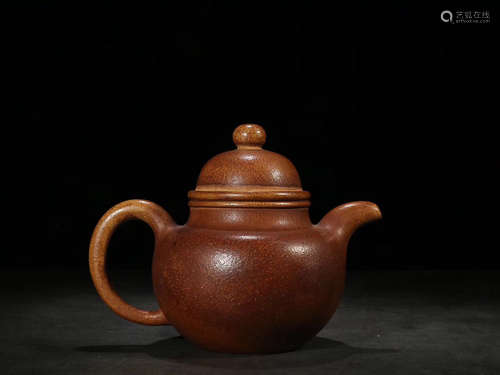 A BALL DESIGN PURPLE CLAY TEAPOT