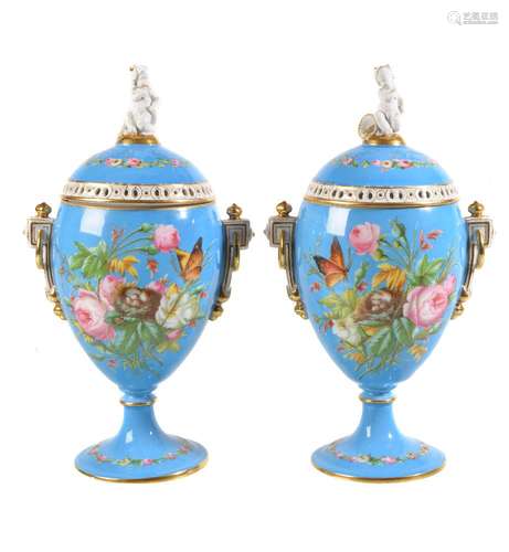 A pair of French porcelain turquois-ground ovoid pedestal pot-pourri vases and covers, third quarter