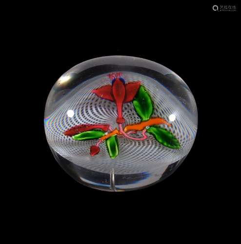 A St. Louis glass 'Fuchia' paperweight, 19th century, the clear glass set with a fuchia flower and a