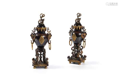 A pair of patinated and parcel gilt bronze urns and covers in the Chinoiserie taste, in the manner