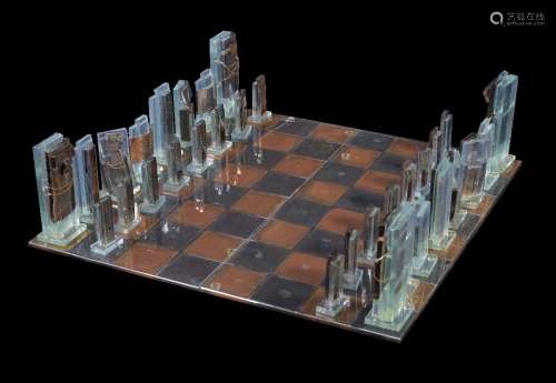 Mabel Waisman (Argentina, 1949-2005), an art glass chess board and pieces, fused slab glass, gold