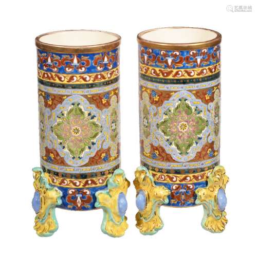 A pair of Fischer Budapest pottery cylindrical vases, circa 1890, printed and painted in the Persian