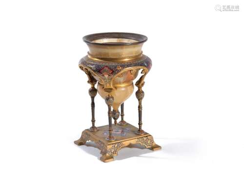 A French champlevé enamel and gilt metal mounted onyx Orientalist urn in stand in the manner of