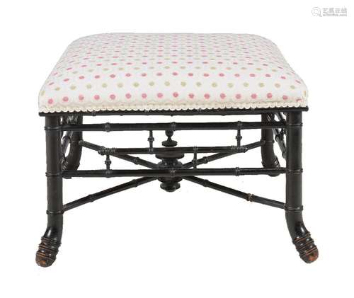 An Aesthetic Movement ebonised and upholstered foot stool, late 19th century, the frame to