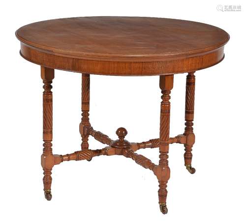 A pair of circular walnut occasional tables in Aesthetic taste, late 19th century and later, each