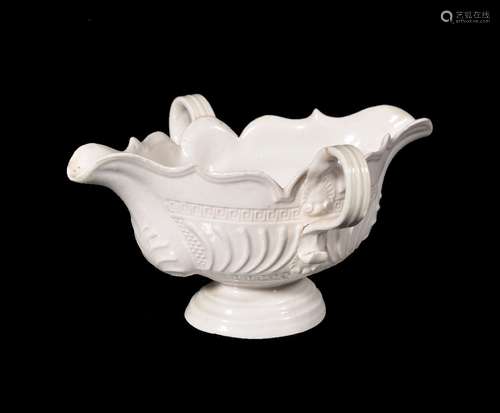 A Staffordshire salt-glazed stoneware two-handled double-spouted sauceboat, circa 1760, of silver-