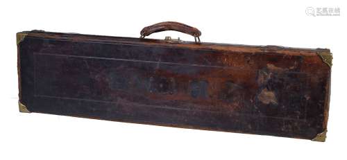 A leather and brass-bound gun case, early 20th century, for a single gun, 9cm x 83cm x 22.5cm