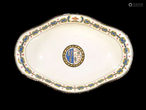 A Turner creamware crested and armorial quatrefoil bowl, late 18th century, decorated with a