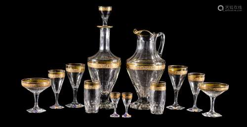 A Moser glass part table service, circa 1962, decorated with an acid-etched and gilt stylised