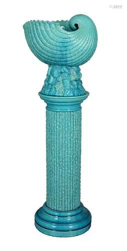 A Burmantofts Faience turquoise glazed jardinière on stand, late 19th century, the shell-shaped