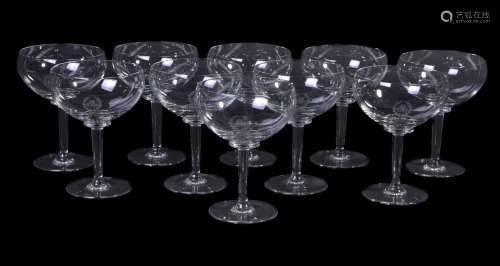 A set of ten modern champagne glasses from the Mirabelle restaurant, Mayfair, each with an acid-