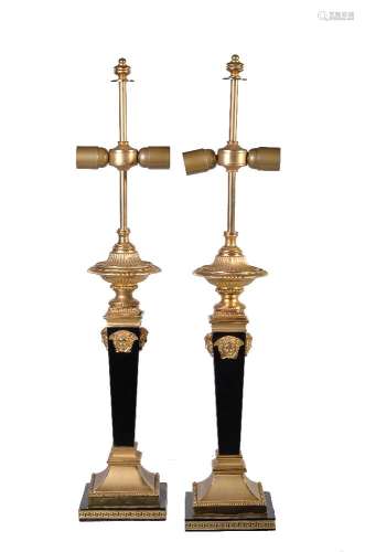 Gianni Versace for Versace Home, a pair of Tronco di Piramide ebonised wood composition and gilt