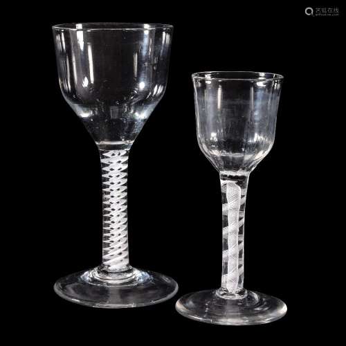 Two opaque-twist wine glasses, circa 1760, each with an ogee bowl supported on a double-series