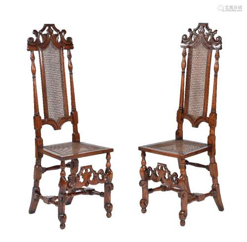 A pair of James II stained walnut and rattan side chairs
