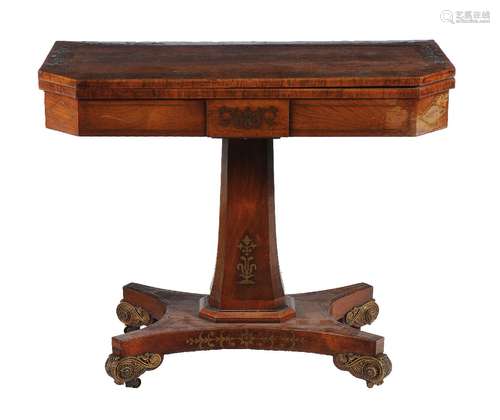 ϒ A Regency rosewood and brass inlaid card table