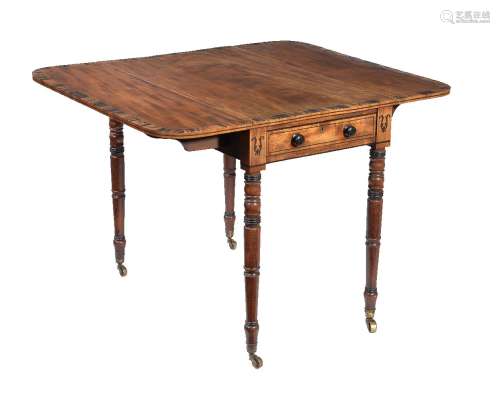 ϒ A Regency mahogany, ebony strung, and calamander banded Pembroke table