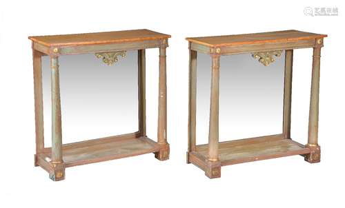 A pair of green painted and parcel gilt console tables in Empire style