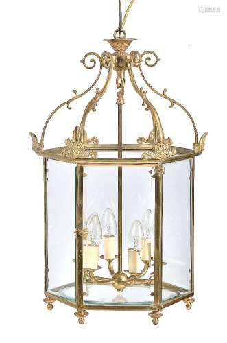 A gilt metal and glazed hexagonal ceiling lantern in Regency taste