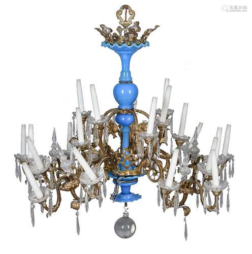 A Continental, probably Italian, gilt metal, blue glass and cut clear glass mounted twenty four ligh