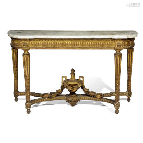 Console à côtés arrondis en bois mouluré, sculpté et doré d'époque Louis XVI.