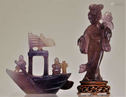 Lot of two amethyst carvings. China. 20th century. A woman and a boat. Fissures. Each about 4