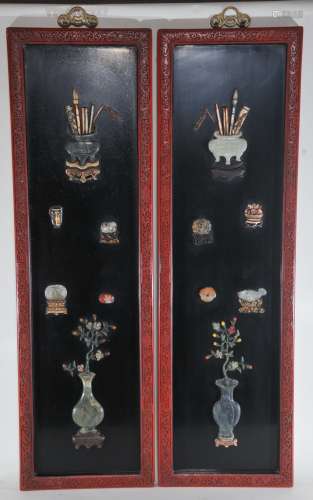 Pair of rectangular wall plaques. China. Early 20th century. Cinebar frames inset with The Hundred Antiques. Inlaid in jade, carnelian, amethyst and other stones. 42-1/2