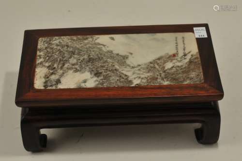 Wooden stand. China. 20th century. Rectangular form with inset marble top. Inscription at the right side top. 8
