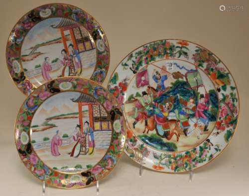 Lot of three export plates. China. 19th century. Rose Mandarin ware. One with an historical scene. And a pair with women in a garden. 9-3/4