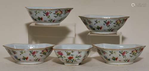 Set of five shaped dishes. China. 19th century. Famille Rose decoration of flowers. (Four d shaped, one squared). Chips to one.