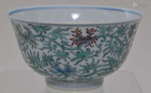 Porcelain cup. China. Early 20th century. Tou Tsai ware. Decoration of floral scrolls. Yung Cheng mark. 4-1/2