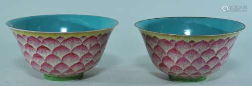 Pair of porcelain bowls. China. Ch'ia Ch'ing mark. (1795-1820) and of the period. Famille Rose decoration of lotus petals; turquoise interiors. 7