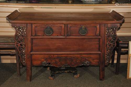 Rosewood Altar table. China. 18th century. Two drawers. Heaven soaring ends. Aprons carved with floral scrolling. Chih Lung and Ling Chih.