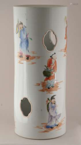 Porcelain hat stand. China. 19th to early 20th century. Cylindrical form with quatrefoil piercings. Famille Rose decoration of the eight immortals. Drilled for a lamp. 12