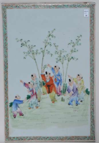 Porcelain plaque. China. Early 20th century. Famille Rose decoration of children playing. 15