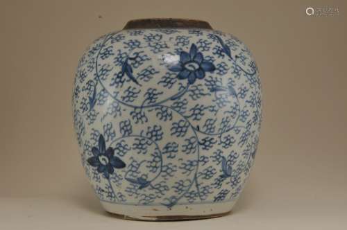 Porcelain jar. China. 19th century. Oviform shape. Underglaze blue floral scroll decoration. 9-1/2