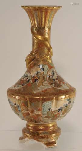 Pottery vase. Japan. Meiji period. (1868-1912). Satsuma ware. Tripod base. Ribbed flare mouth. Relief dragon about the neck. Decoration of warriors and brocade patterns. Signed. 8-3/4