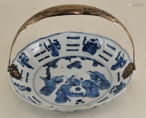 Porcelain saucer dish. China. 18th century. Lobated form. Underglaze blue decoration of the trigrams, auspicious emblems. 6-1/2