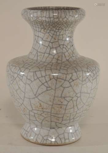 Porcelain vase. China. 20th century. K'o style glaze. White with a pronounced crackle. 8-3/4