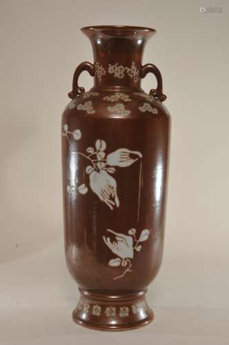 Porcelain vase. China. 19th century. Cylindrical form. Resist decoration of Buddha's hand citrons on a persimmon ground. 18
